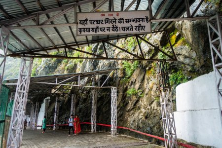 Photo for July 5th 2022 Katra, Jammu and Kashmir, India. A Public Notice board written in Hindi Language addressing "the dangers of falling stones from the Mountains". Beware of the free falling stones. - Royalty Free Image