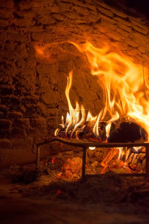Photo for Fire burning in the furnace. Close up view of wood in flames - Royalty Free Image