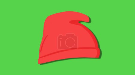 Traditional french red cap on green background.