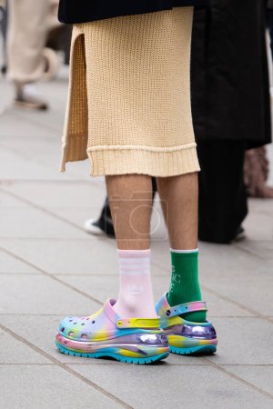 Photo for Paris, France - October, 3, 2022: man wears Lazy Oaf and Crocs collaboration pairs of clogs, street style details. - Royalty Free Image