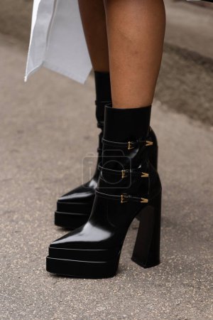 Photo for Milan, Italy - September, 25: woman influencer wearing Aevitas pointy platform boots from Versace. Fashion blogger outfit details, street style. - Royalty Free Image