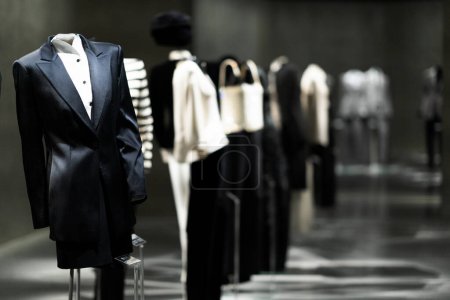Photo for Italy, Milan - 04 December, 2022: Permanent exhibition space with luxury dresses and costumes. Armani Silos, the fashion art space in Milan dedicated to the Armani style. Women collection. - Royalty Free Image