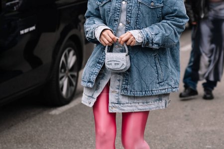 Photo for Milan, Italy - February 22, 2023: fashioner wearing Diesel 1DR shoulder bag. Fashion blogger outfit details, street style - Royalty Free Image