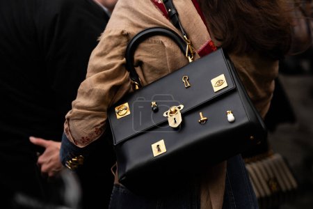 Photo for Paris, France - January, 22, 2024: woman wears Schiaparelli large secret Bijoux bag, fashion blogger outfit details, street style. - Royalty Free Image
