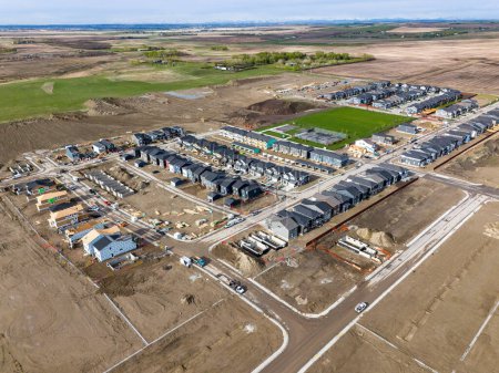 New home construction aerial shot with residential roads overlooking Rocky View County  in Airdrie Alberta Canada