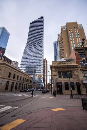 Photo for Calgary Alberta Canada, April 03 2024: Downtown city view of historic buildings and popular landmarks at an intersection. - Royalty Free Image
