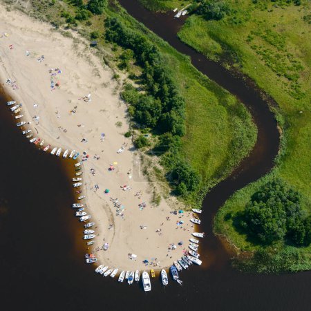 Photo for Aerial view of beach with sunbathing people, Sweden. - Royalty Free Image