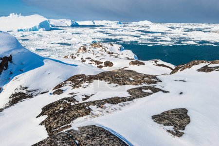 Téléchargez les photos : Le fjord Ilulissat est un fjord de la baie de Dissko sur la côte ouest du Groenland.. - en image libre de droit