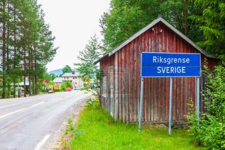 Photo for Old red building at cross border, Sweden - Royalty Free Image
