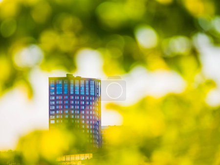 Photo for City residential building surrounded by lush green trees in Gothenburg. - Royalty Free Image