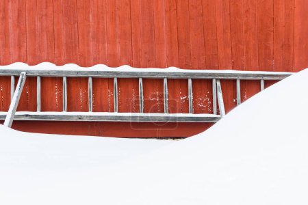 Photo for Ladder on red building, Sweden - Royalty Free Image