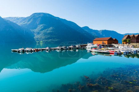 Photo for LUSTERFJORDEN, NORWAY - JULY 4, 2018: Harbor and boats in fjord - Royalty Free Image