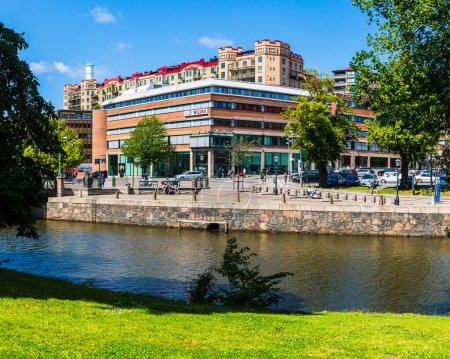 Photo for Cityscape with a waterfront building, trees, and blue sky in Gothenburg, Sweden. - Royalty Free Image