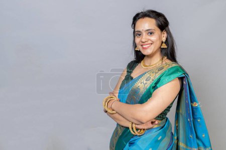 Photo for Portrait of Happy smiling Indian woman in saree looking towards the camera - Royalty Free Image