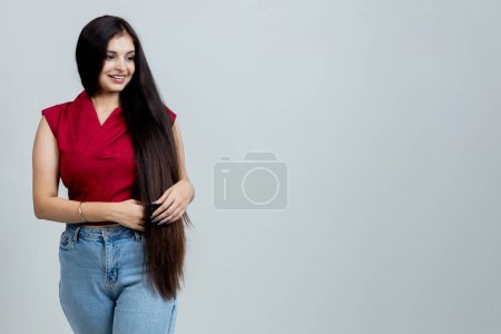 Photo for Indian latin Girl with straight long shiny hair. Beauty and hair care - Royalty Free Image