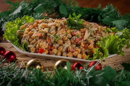 Photo for Cod salad with chickpeas. dish served at Christmas dinner. Christmas Salad. - Royalty Free Image