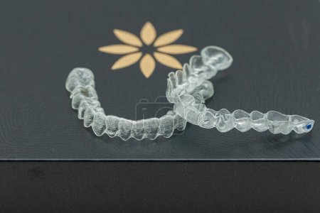 Photo for Rio de Janeiro, RJ, Brazil. 07.01.2023. Invisalign aligners in a box. Invisible staples. Clear teeth straighteners. clear plastic clamps - Royalty Free Image