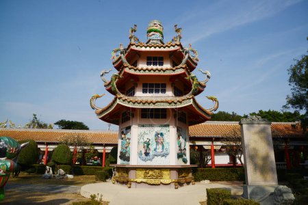 Chinese pagoda at Dhammaktanyu Foundation Shrine or Dhammaktanyu Temple or Xianlu Dai Tiang Kong. This architecture is full of ancient Chinese arts and culture. Including the stone carvings, they are very meticulous. At Samut Prakan city in Thailand.