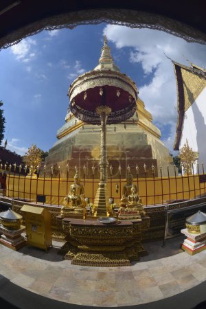 Phra That Cho Hae is an octagonal pagoda with twelve recessed wooden corners lined with gold flowers is 33 meters high. Inside the pagoda are the relics of the Lord Buddha. Located at Phrae Province in Thailand.