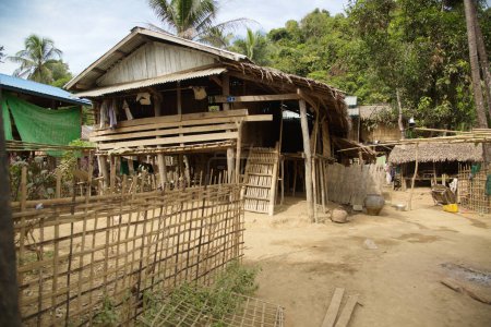 Home of the Moon Tribe, Mindat City, Chin State, where women have their faces tattooed with black ink. Houses are in poor condition, without electricity or running water.