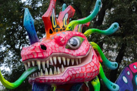 Photo for Alebrijes, mexican tradition, colorful dragon head with bright colors. close up. - Royalty Free Image