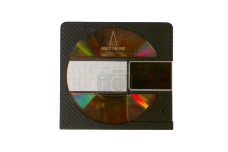 Téléchargez les photos : Studio shot of a vintage Mini Disc from the nineties isolated on a white background. - en image libre de droit