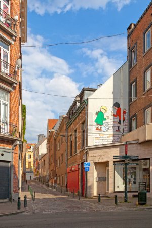Photo for Brussels, Belgium - July 02 2019: The Quick and Flupke Wall is located "Rue Notre-Seigneur" few meters away from the theater "Les Brigittines". The wall illustrates Quick and Flupke making a wall coating. Based on the comic series "Quick and Flupke". - Royalty Free Image
