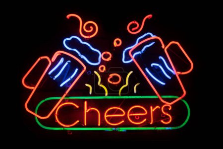 Photo for Neon light shaped into two pint of beers with the word Cheers below it. - Royalty Free Image