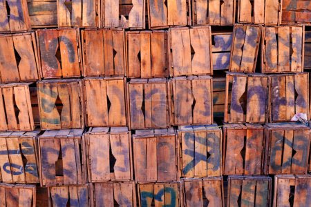 Pile of old numbered wooden crates in Ait Benhaddou in Morocco.