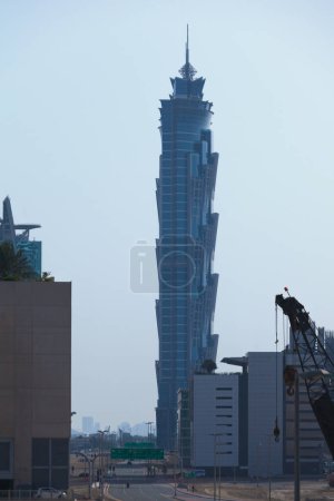 Photo for Dubai, UAE - March 21 2014: The JW Marriott Marquis Dubai Hotel is the world's second tallest hotel, a 72-storey, 355 m (1,165 ft) twin-tower skyscraper complex in Dubai, United Arab Emirates. - Royalty Free Image