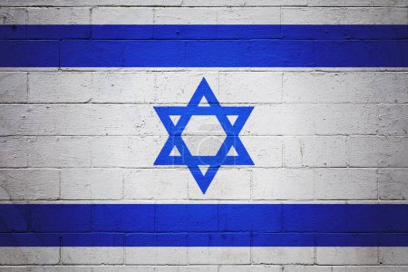 Téléchargez les photos : Drapeau d'Israël peint sur un mur de blocs de cendres. - en image libre de droit