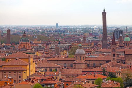 Photo for Aerial view of Bologna in Italy with some of the most iconic landmarks in the city: the Basilica of San Domenico, the Asinelli Tower, the church of Santi Bartolomeo e Gaetano, the Torre Prendiparte and the Santa Maria della Vita. - Royalty Free Image
