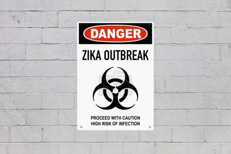 Photo for Black, red and white danger sign attached on a brick wall painted in grey. The sign stating Danger - Zika outbreak - Proceed with caution, high risk of infection. - Royalty Free Image