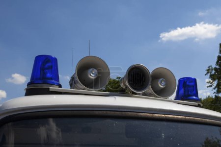 Photo for Close-up on the siren of an old Volkspolizei on the top of a Barkas van. The Deutsche Volkspolizei (DVP, German for "German People's Police"), commonly known as the Volkspolizei or VoPo, was the national police force of the German Democratic Republic - Royalty Free Image