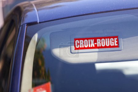 Photo for Red sun visor with written in French "Croix-rouge" meaning in English "Red cross". - Royalty Free Image