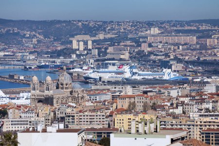 Photo for Marseille, France - March 23 2020: Aerial view of the Marseille Cathedral and the Marseille Fos Port. - Royalty Free Image