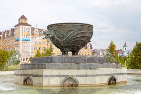Photo for Kazan, Russia - July 13 2018: Fountain in the middle of Kazan Millennium Park. The fountain represant a Zilant, a legendary creature, something between a dragon and a wyvern. - Royalty Free Image
