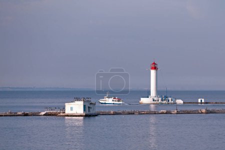 Ferry passing by the Vorontsov Lighthouse on its way out of Odessa port.