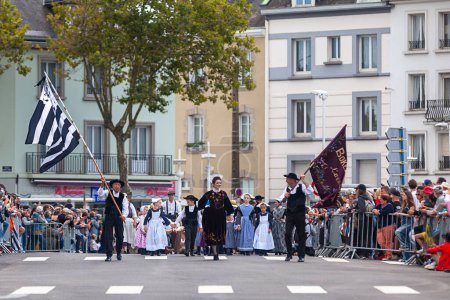 Photo for Lorient, France - August 06 2023: The bagad Boked er Lann from Larmor plage closing the parade of the Lorient Interceltic Festival. - Royalty Free Image