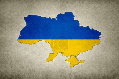 Carte grunge de l'Ukraine avec son drapeau imprimé à l'intérieur de sa frontière sur un vieux papier.
