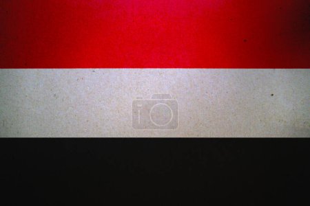 Flagge des Jemen auf Papierbogen gedruckt.