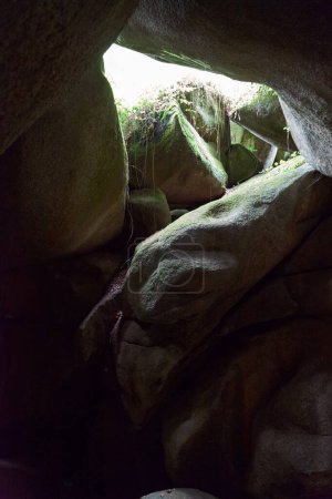 Famous "Grotte du Diable" (Devil's cave) in the forest of Huelgoat in Brittany is refering to a gap in the rocks at the blockfield around the Riviere d'Argent (Silver River).