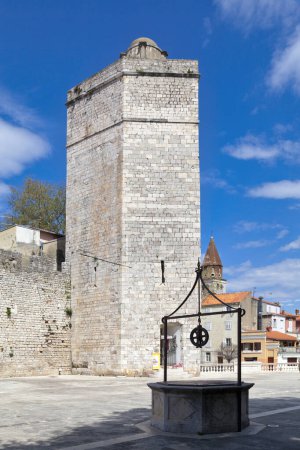 Photo for Zadar, Croatia - April 15 2019: The "Kapetanova kula" (Captain's tower) is located in Five Wells Square in the old town. - Royalty Free Image