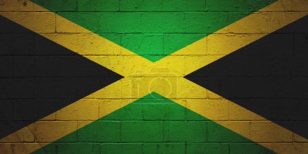 Flagge von Jamaika an eine Wand aus Schlackenblöcken gemalt.