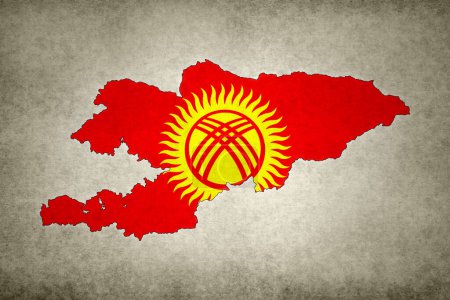 Grunge map of Kyrgyzstan with its flag printed within its border on an old paper.