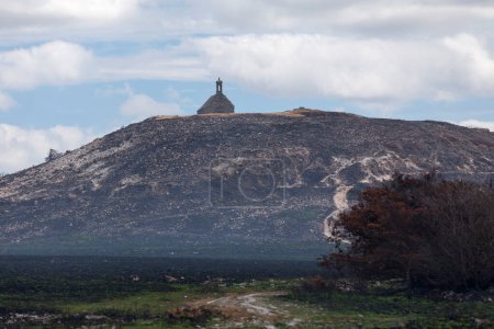 The Saint-Michel chapel at the top of the Mont Saint-Michel de Brasparts still smoky after the arson attack that occurred 2 weeks earlier in the Monts d'Arree in Finistere, Brittany.