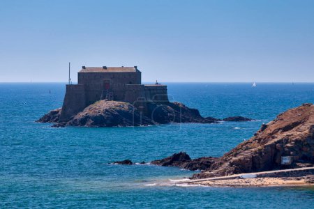 Petit Be is a tidal island near the city of Saint-Malo, France, close to the larger island of Grand Be. At low tide one can walk to the island from the nearby Bon-Secours beach.