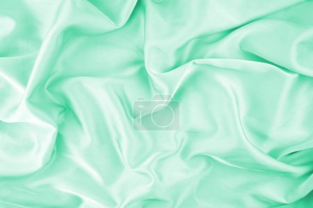 Photo for Turquoise chiffon fabric texture for background. Silk fabric. Selective focus. - Royalty Free Image