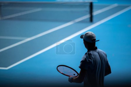 Photo for Professional athlete playing tennis on a sports court in europe. - Royalty Free Image