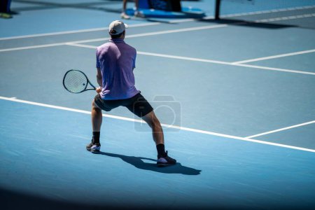 Photo for Athlete playing tennis. Amateur female tennis player hitting a forehand playing tennis summer - Royalty Free Image